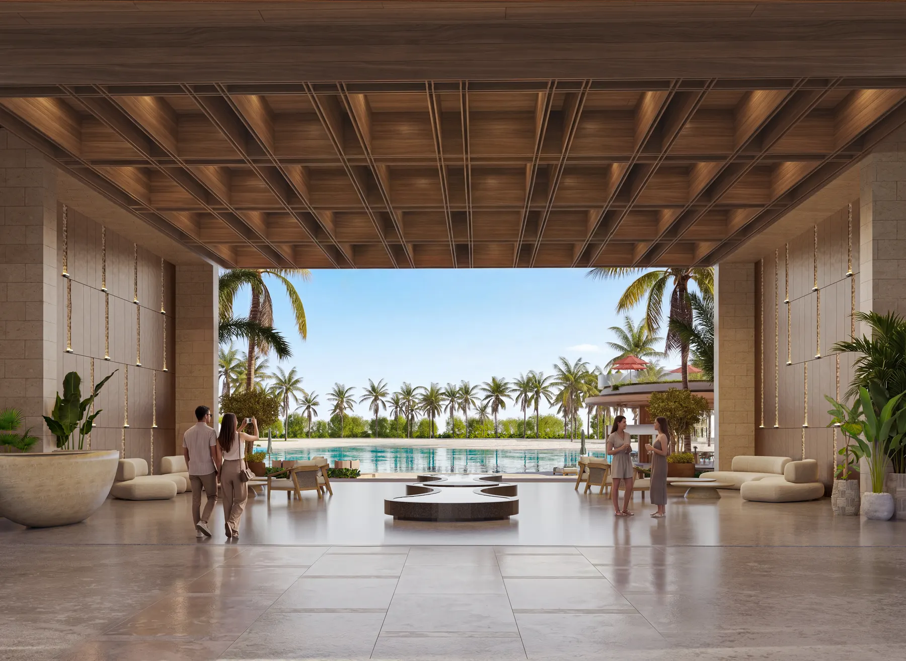The lobby of Bonita Beach under a timber ceiling, open to the lagoon and the palms beyond.