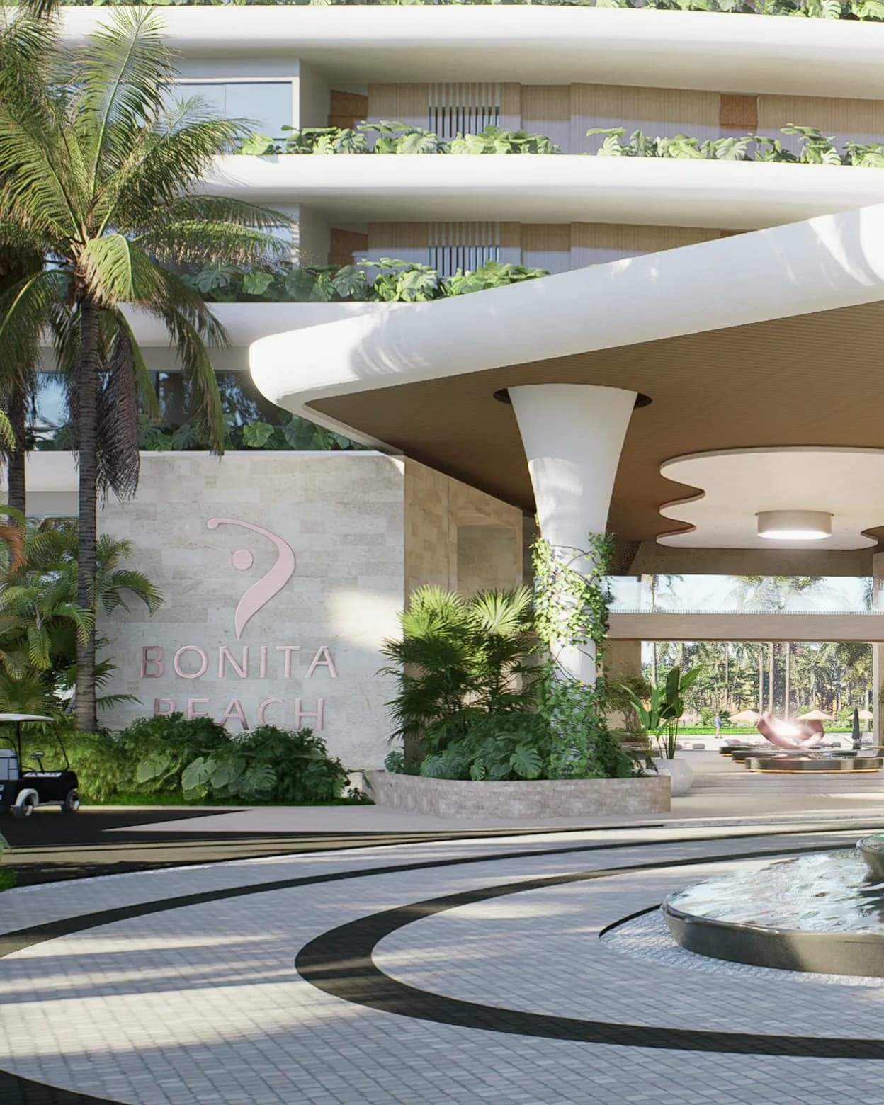 The entrance of Bonita Beach: a stone sculpture and a fountain under a timber canopy, with the lobby and the lagoon beyond.